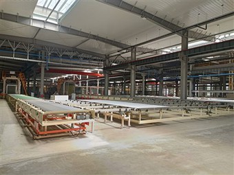 Belt And Roller Conveyor System For Post-Unloading Frames
